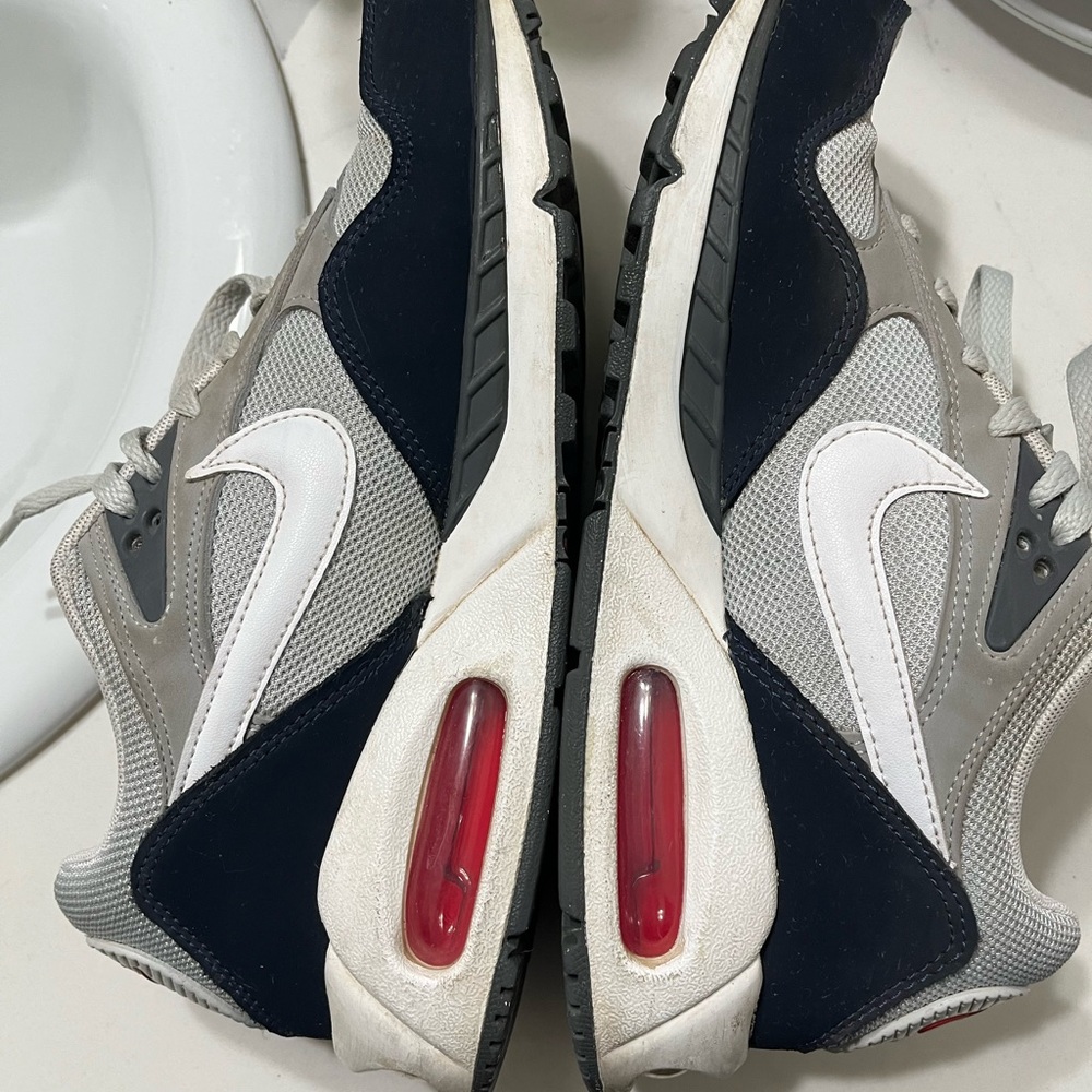 Nike Sneakers with Gray, Black, and Red Accents